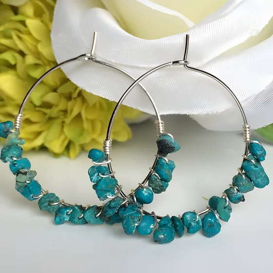 Turquoise hoop earrings by Ritu Java